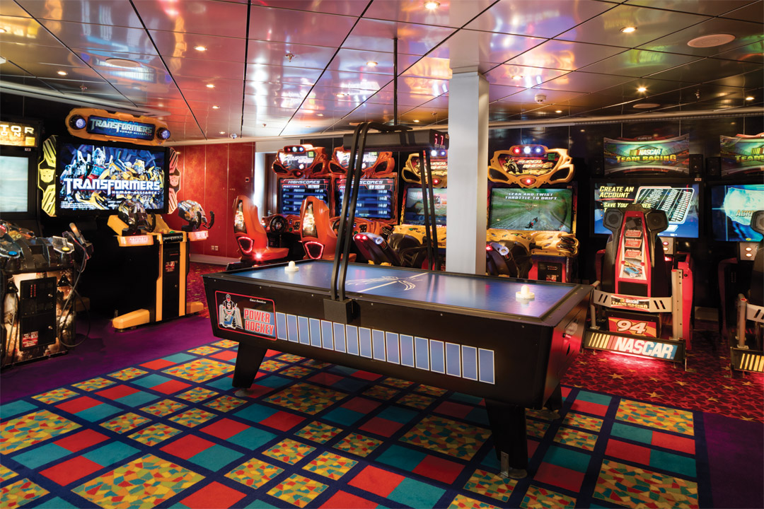  Guests of all ages can have fun racing cars, shooting targets and playing modern and classic arcade favorites in the onboard video game room. 