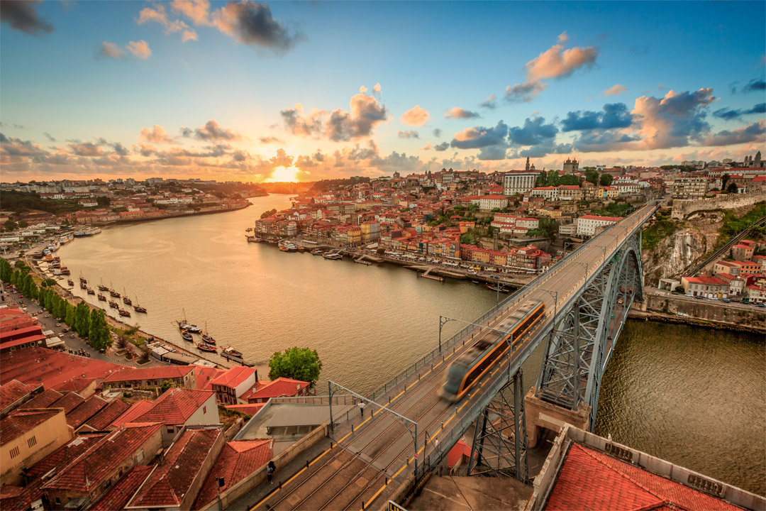  The sun setting over Porto, Portugal. 