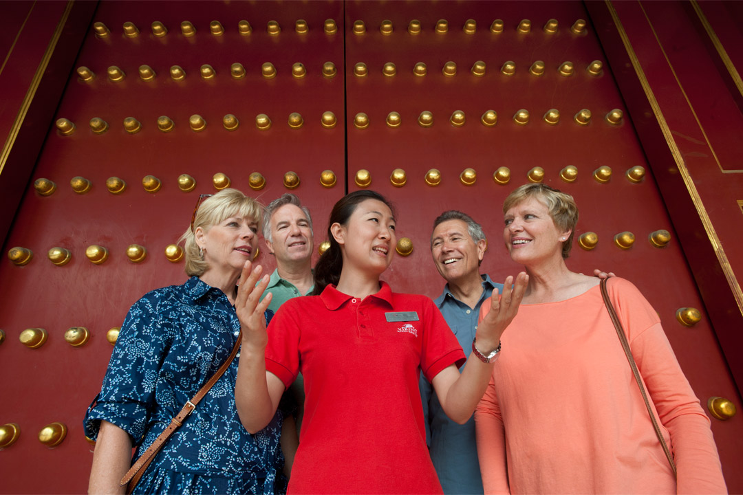  A tour group outside the entrance to the Forbidden City.  