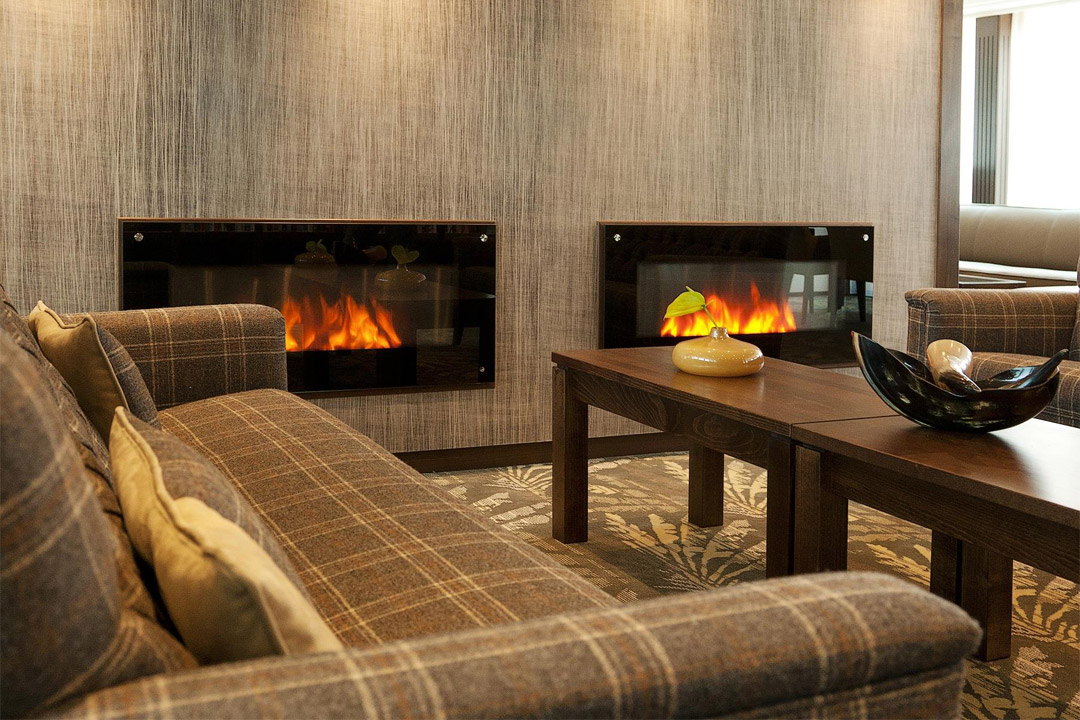  Relax by the fireside in the onboard library 