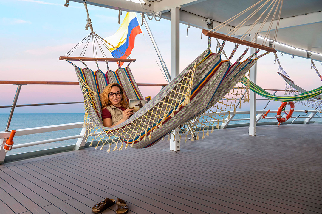 Relaxing in a hammock aboard <em>National Geographic Islander II</em>. *Image by David Vargas