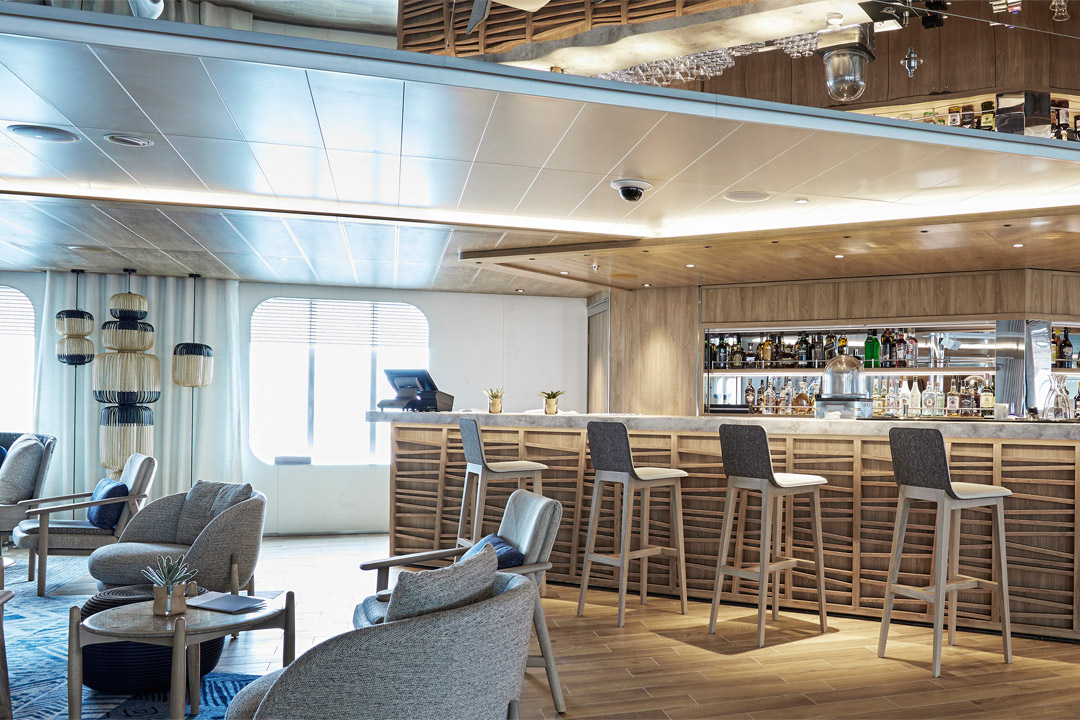  You can relax and grab a drink in the ship’s beautifully-designed lounge.