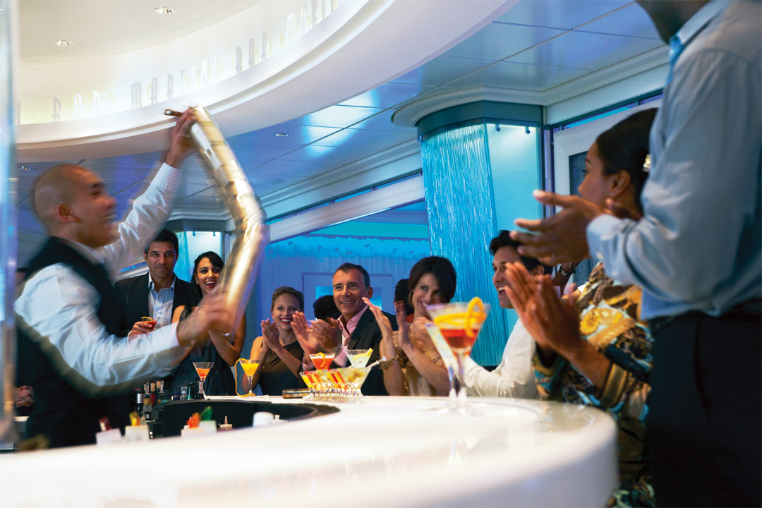  Enjoy a unique pouring performance in the ship’s Martini Bar. 