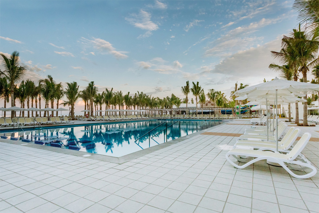 One of the many refreshing swimming pools at Hotel Riu Emerald Bay.