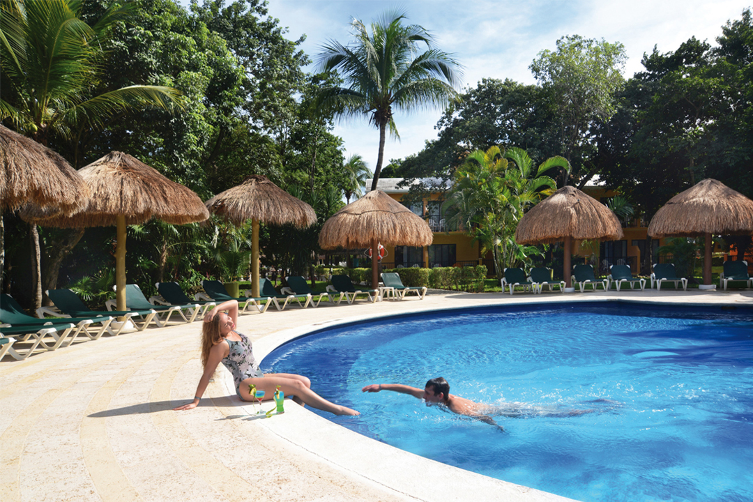 Go for a cool dip in one of the outdoor swimming pools at Hotel Riu Lupita.