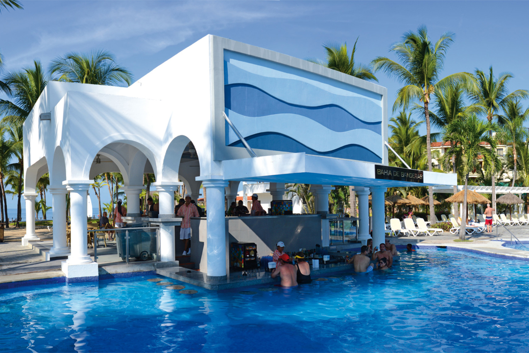Grab a drink at the pool's swim-up bar.