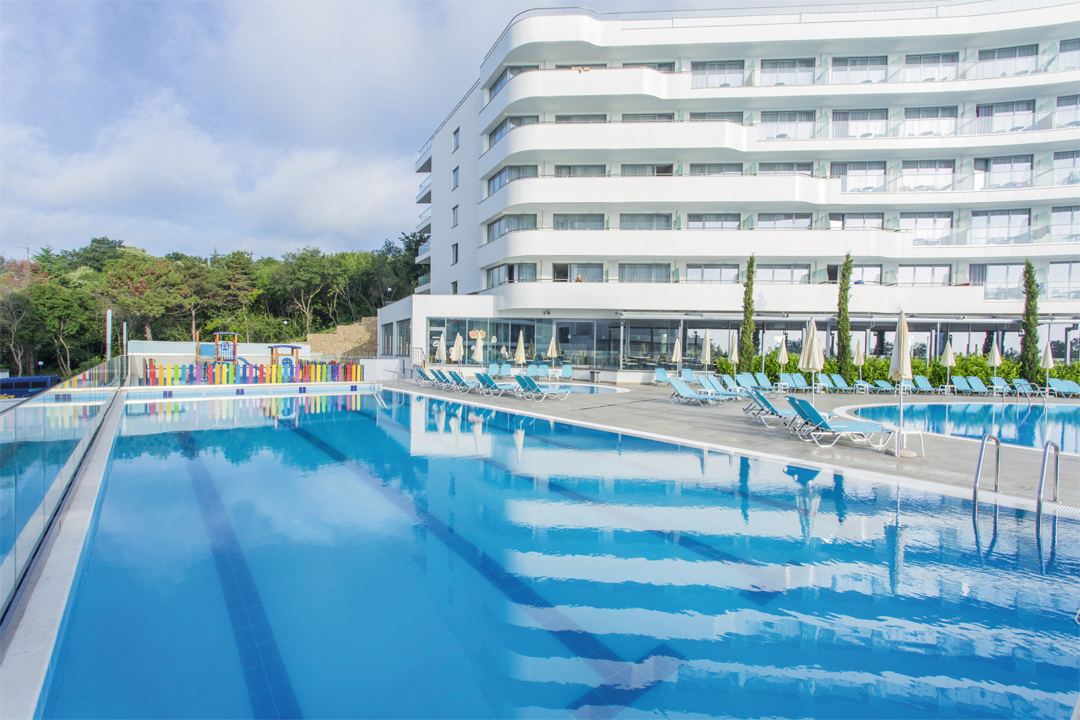 One of five swimming pools at Hotel Riu Astoria