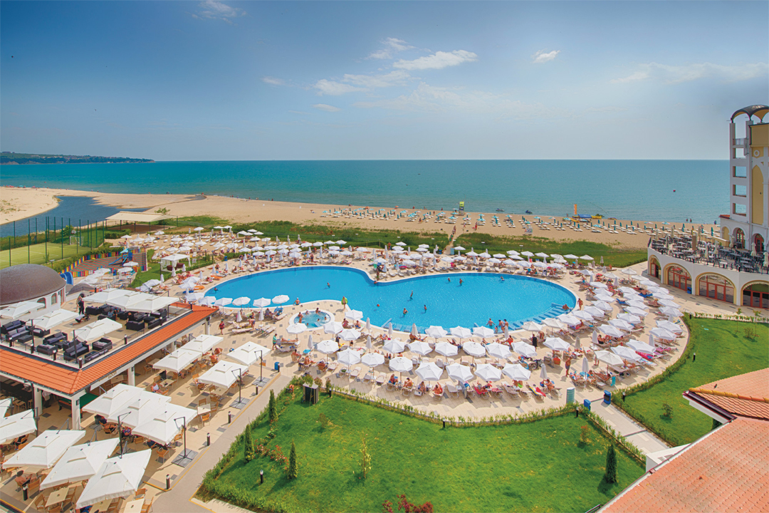  Relax at Hotel Riu Helios Bay's outdoor swimming pool.
