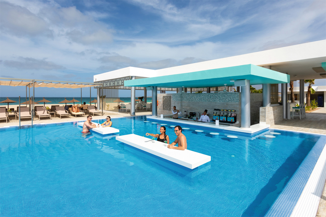 Enjoy a refreshing swim in the pool at Hotel Riu Palace Boavista.