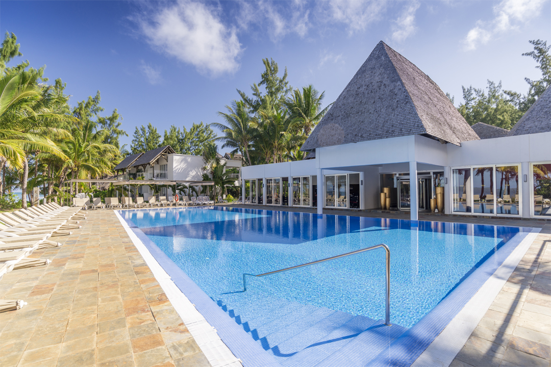 There are multiple outdoor swimming pools at Hotel Riu Creole.